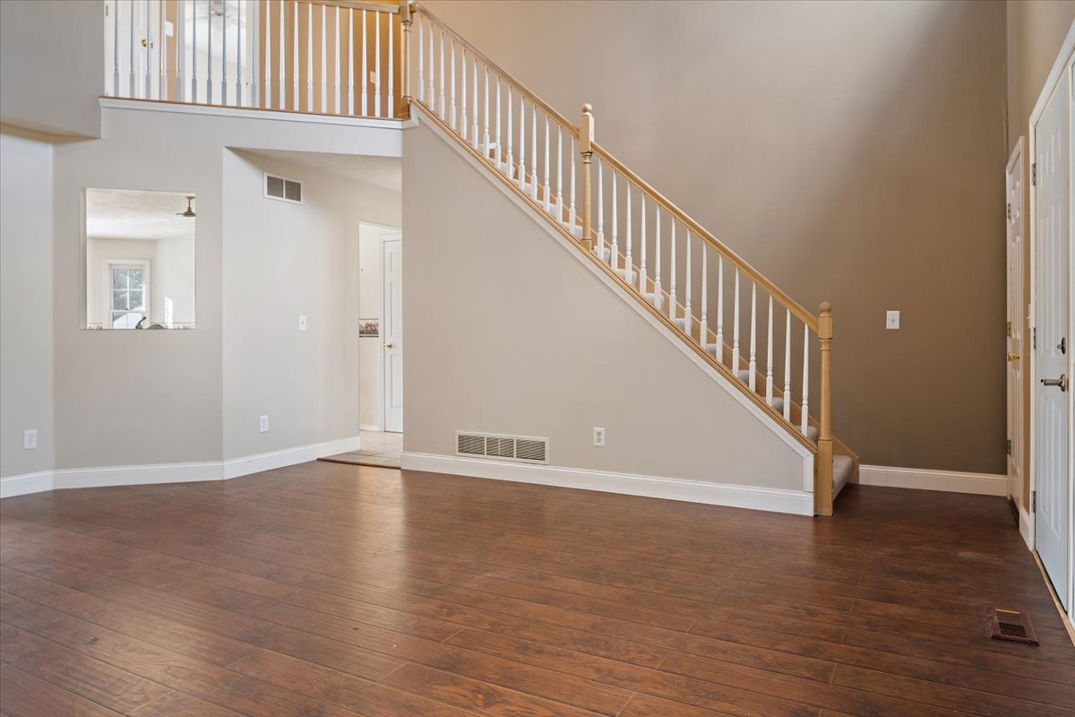 606 Windward Way Heyworth, IL 61745 - Photo 14 of 30 a view of an entryway with wooden floor