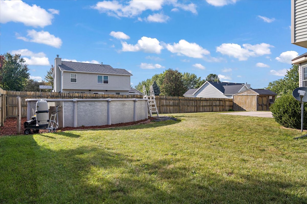 606 Windward Way Heyworth, IL 61745 - Photo 28 of 30 a view of a house with a yard and sitting area