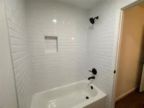 a bathroom with a bathtub