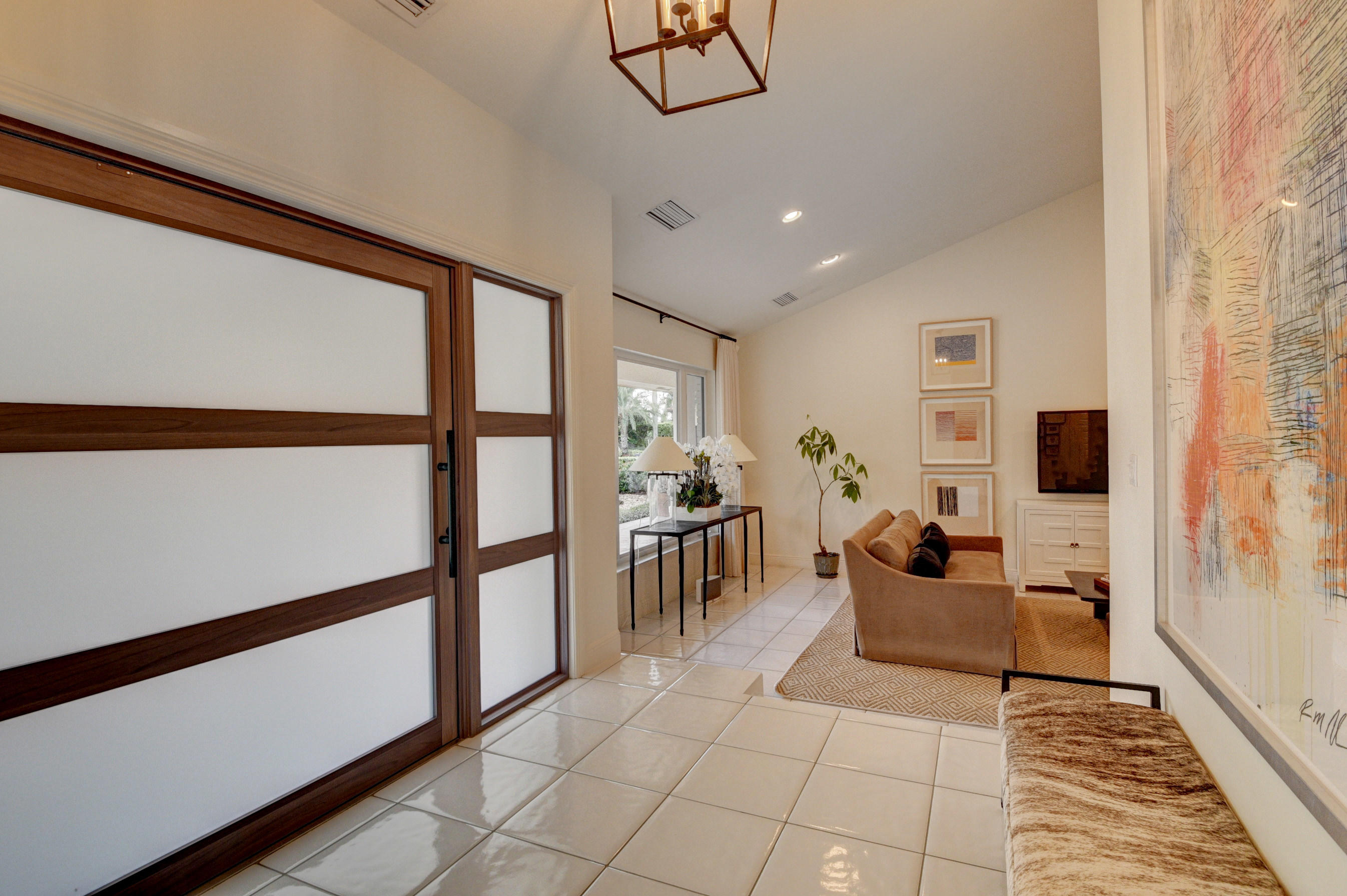7624 Marbella Terrace Boca Raton, FL 33433 - Photo 5 of 55 a living room with furniture and a table