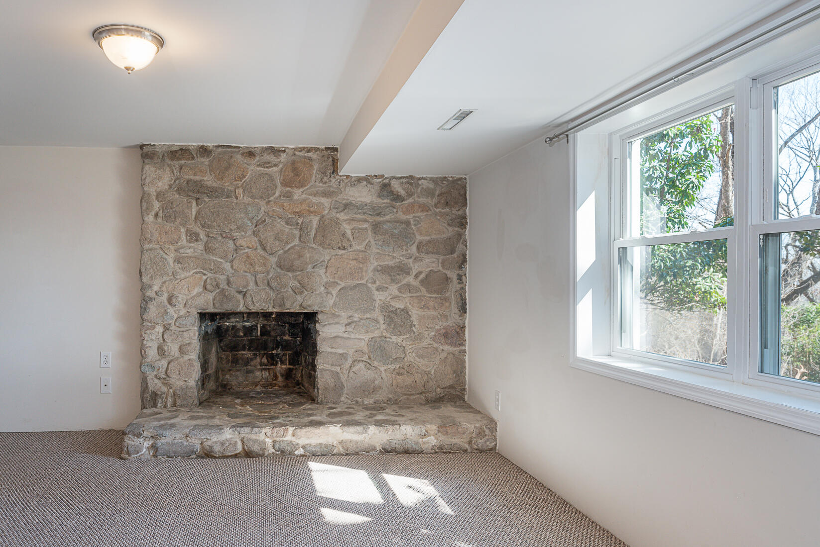 724 Eddies Road Salem, VA 24153 - Photo 36 of 54 a living room with a fireplace in it