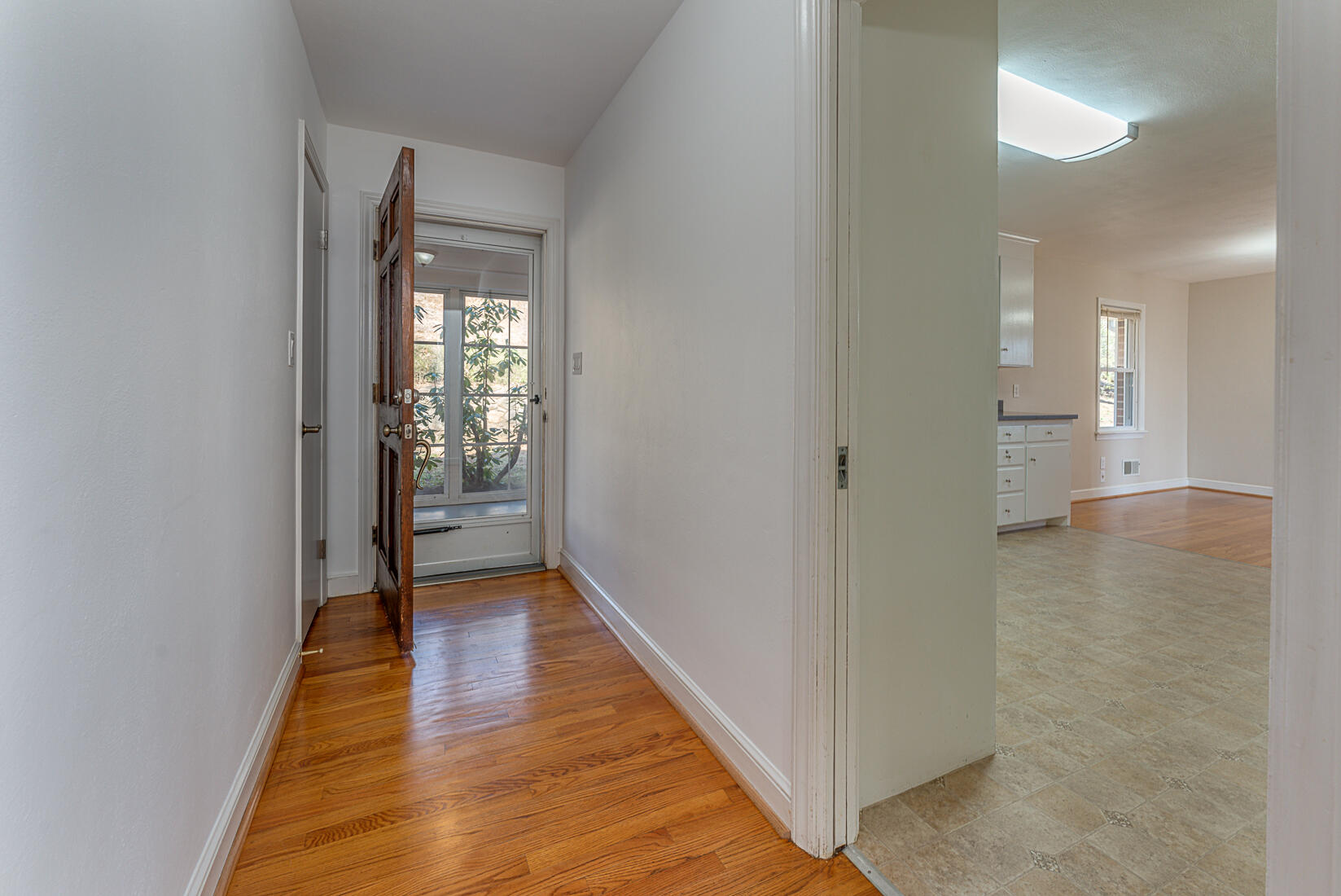724 Eddies Road Salem, VA 24153 - Photo 7 of 54 a view of a hallway with wooden floor