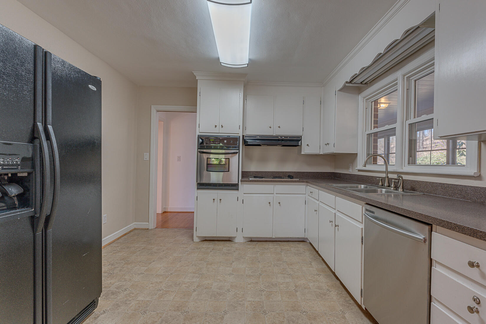724 Eddies Road Salem, VA 24153 - Photo 8 of 54 a kitchen with kitchen island granite countertop a sink stainless steel appliances and cabinets