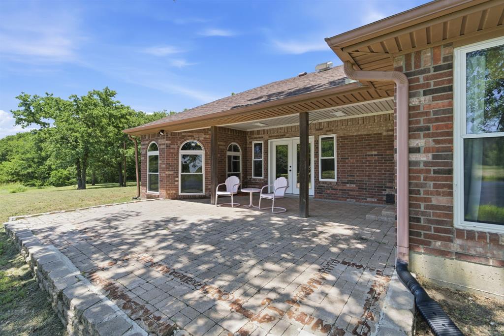 321 Cr 211 Road Gainesville, TX 76240 - Photo 22 of 40 Back patio overlooking the pond