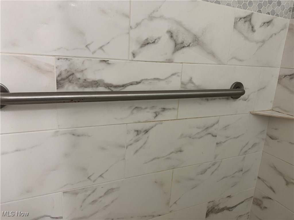 5544 Hauserman Road Cleveland, OH 44130 - Photo 29 of 41 Bathroom view of a tile shower