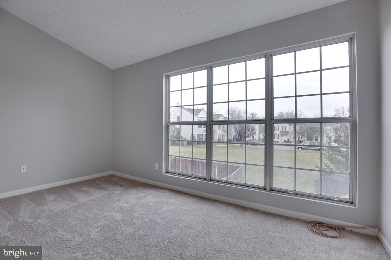 3005 McMaster Court Herndon, VA 20171 - Photo 20 of 26 a view of an empty room with a large window