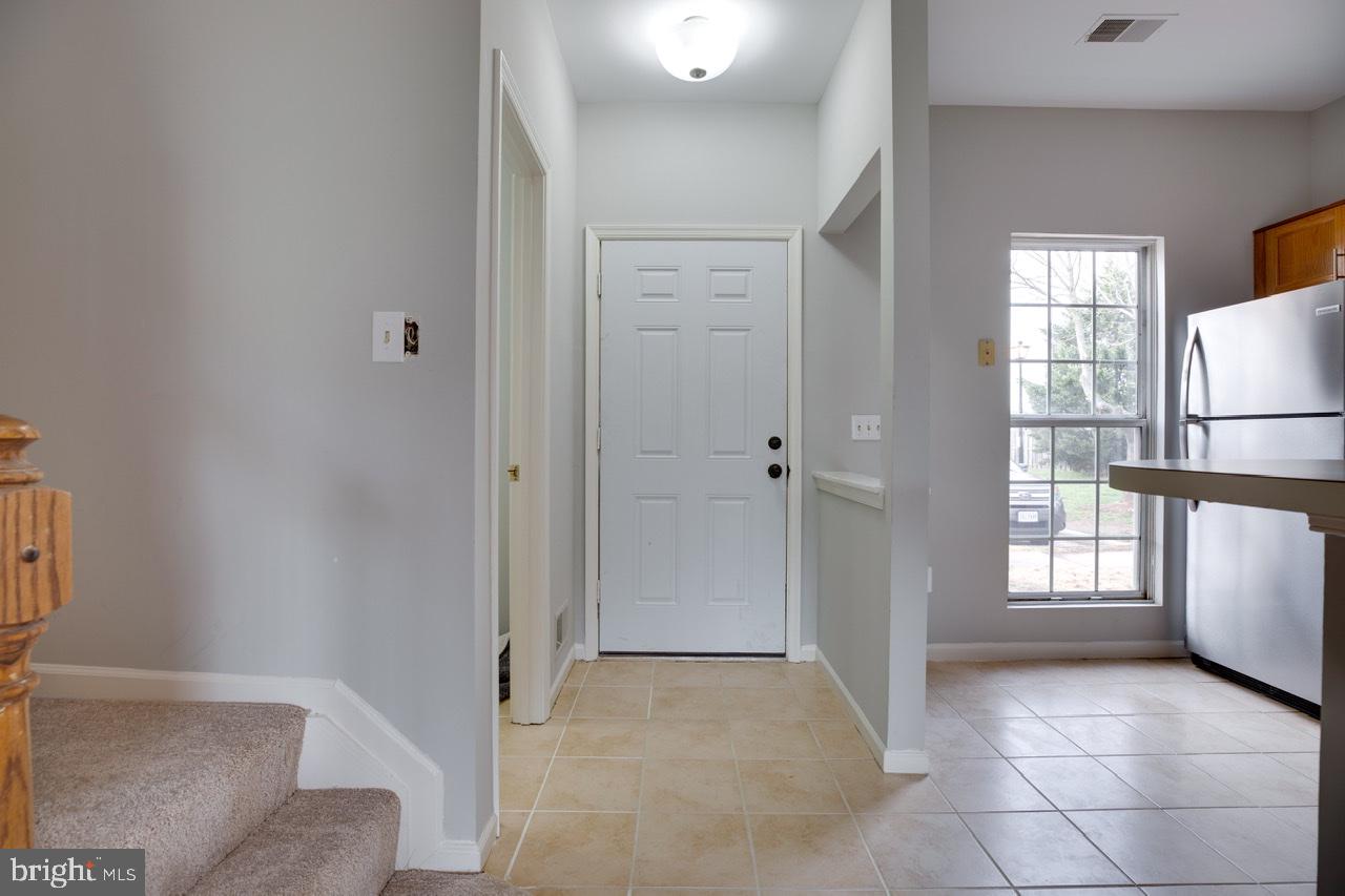 3005 McMaster Court Herndon, VA 20171 - Photo 2 of 26 a view of kitchen with furniture and refrigerator