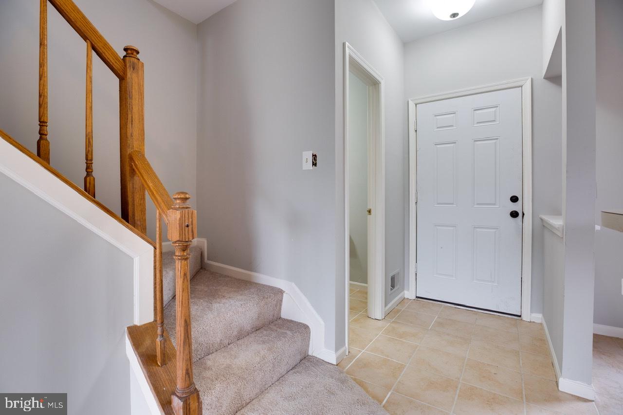 3005 McMaster Court Herndon, VA 20171 - Photo 4 of 26 a view of an entryway with staircase