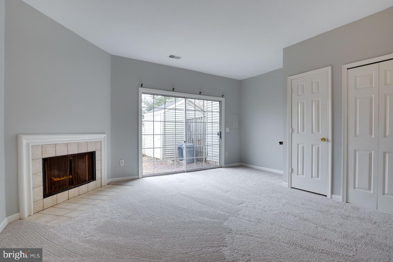 3005 McMaster Court Herndon, VA 20171 - Photo 10 of 26 a view of empty room with a fireplace