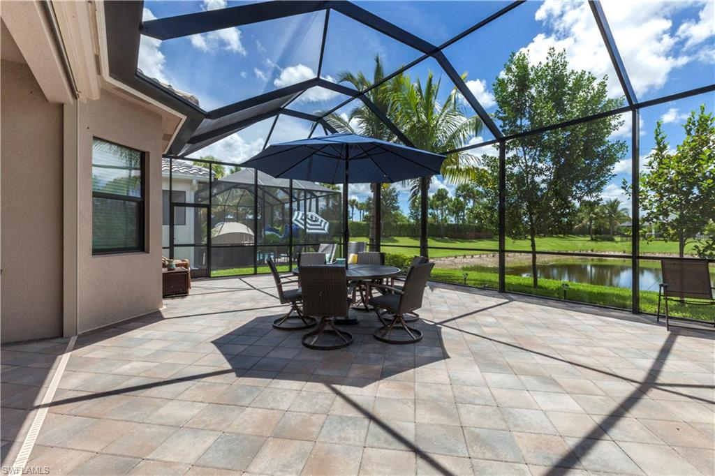 4310 Aurora Street Naples, FL 34119 - Photo 15 of 17 a view of outdoor space yard and patio