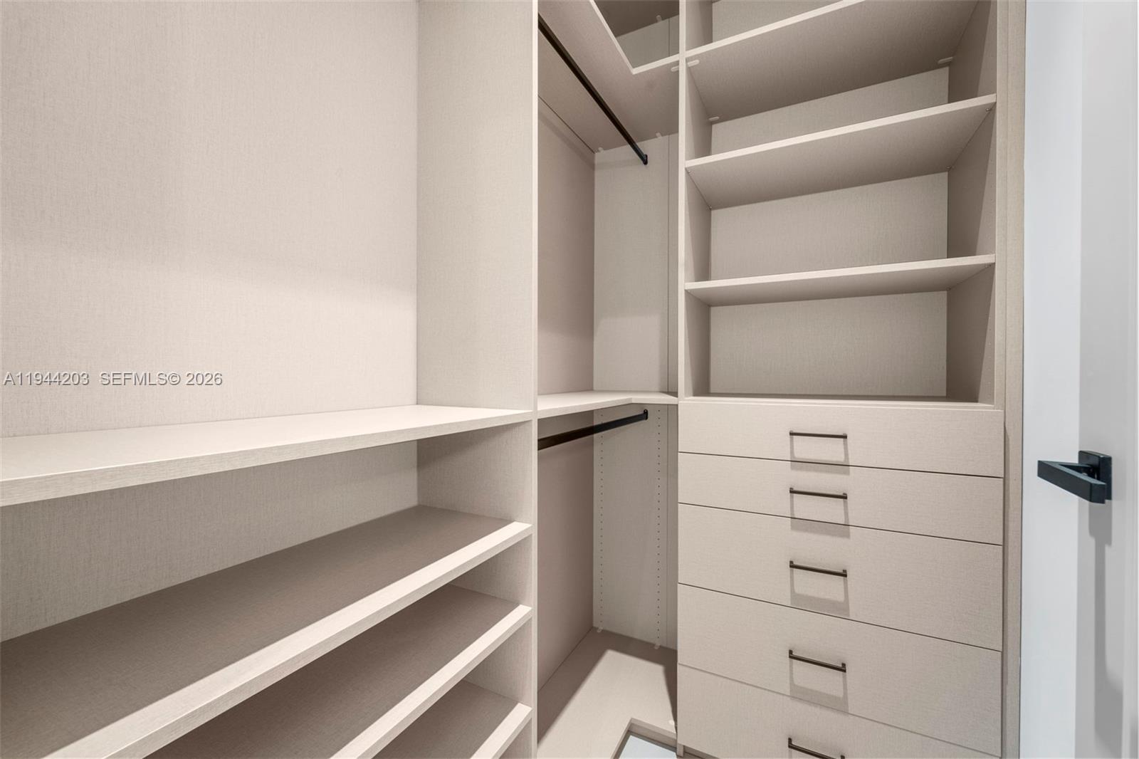 685 Northeast 81st Street Miami, FL 33138 - Photo 20 of 30 a view of walk in closet