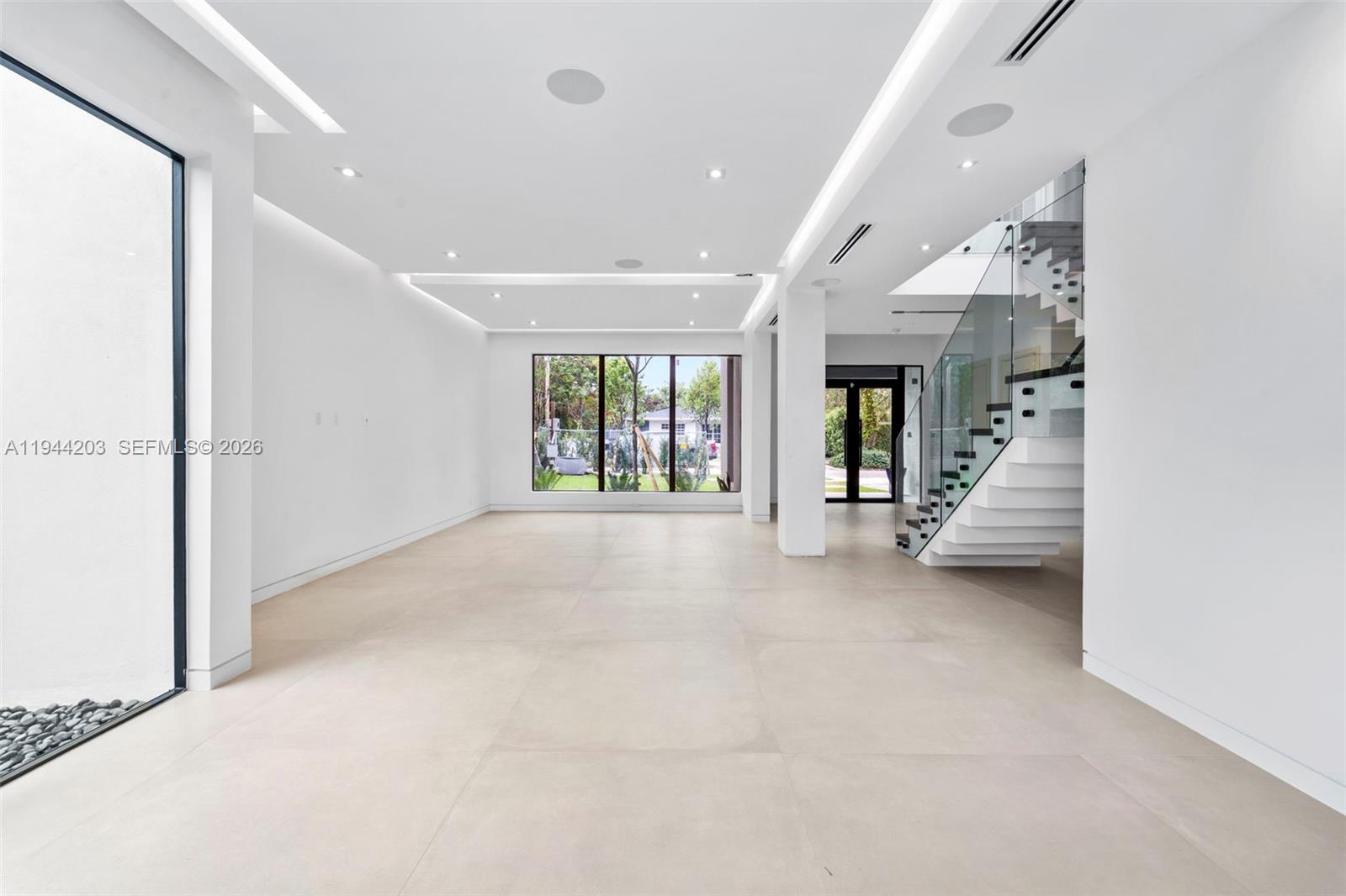 685 Northeast 81st Street Miami, FL 33138 - Photo 5 of 30 a view of an entryway with a hallway
