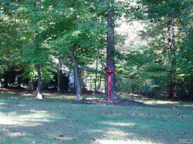12000 Peed Road Raleigh, NC 27614 - Photo 6 of 12 Bits of whimsy. View of all multi-purpose building in woods.