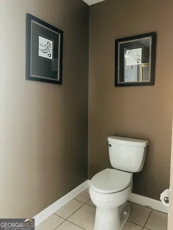 a bathroom with a sink vanity and a mirror