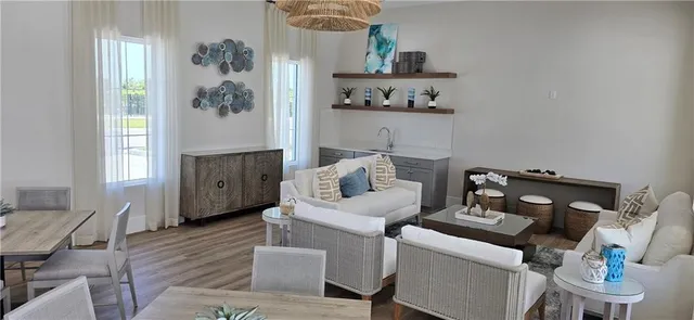 a living room with furniture and a window