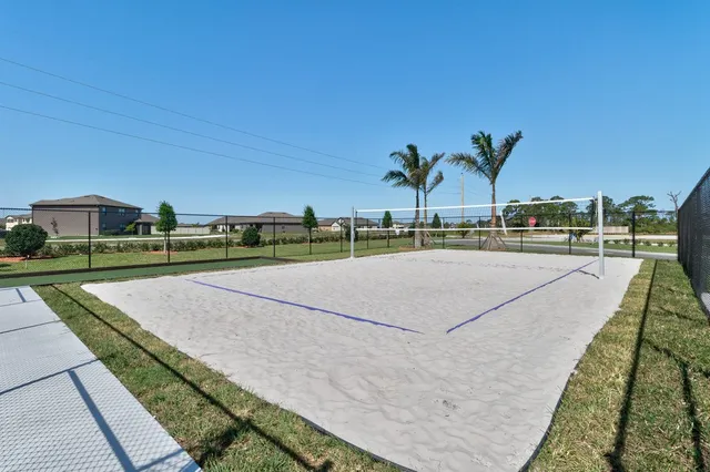 a view of swimming pool with a lounge chair