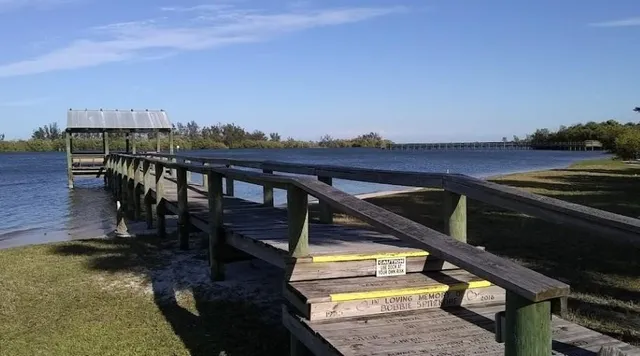 a view of a balcony with an outdoor seating