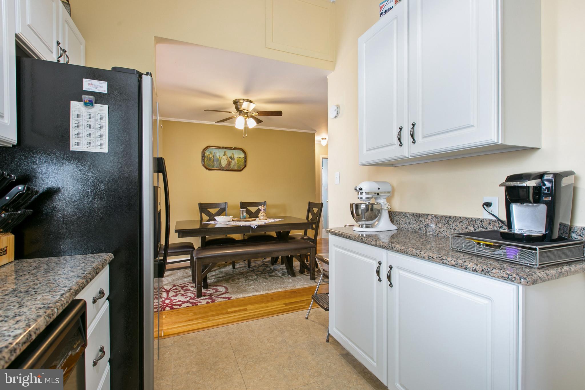 7615 Merritt Point Road Baltimore, MD 21222 - Photo 15 of 42 KItchen looking into the dining room