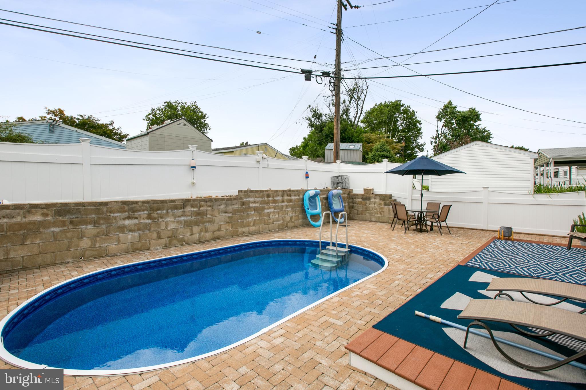 7615 Merritt Point Road Baltimore, MD 21222 - Photo 39 of 42 Raised deck overlooking the pool