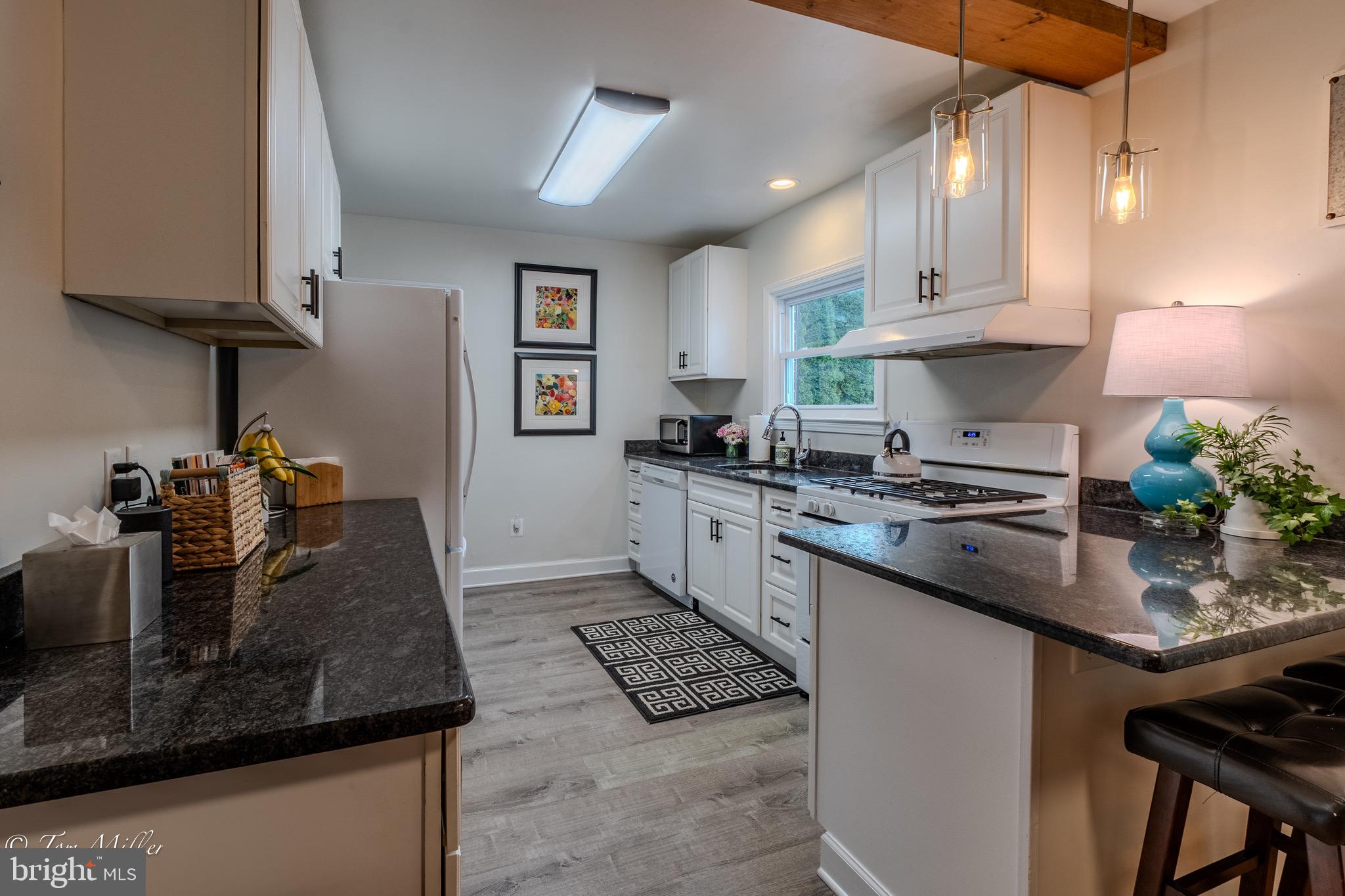418 Range Road Baltimore, MD 21204 - Photo 10 of 39 Kitchen with LVP Flooring
