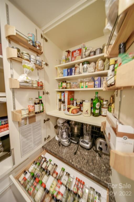 811 Queens Road, Unit 2 Charlotte, NC 28207 - Photo 11 of 31 a kitchen with stainless steel appliances granite countertop a sink and a stove