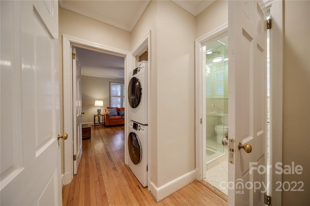811 Queens Road, Unit 2 Charlotte, NC 28207 - Photo 16 of 31 a view of a hallway with washer and dryer