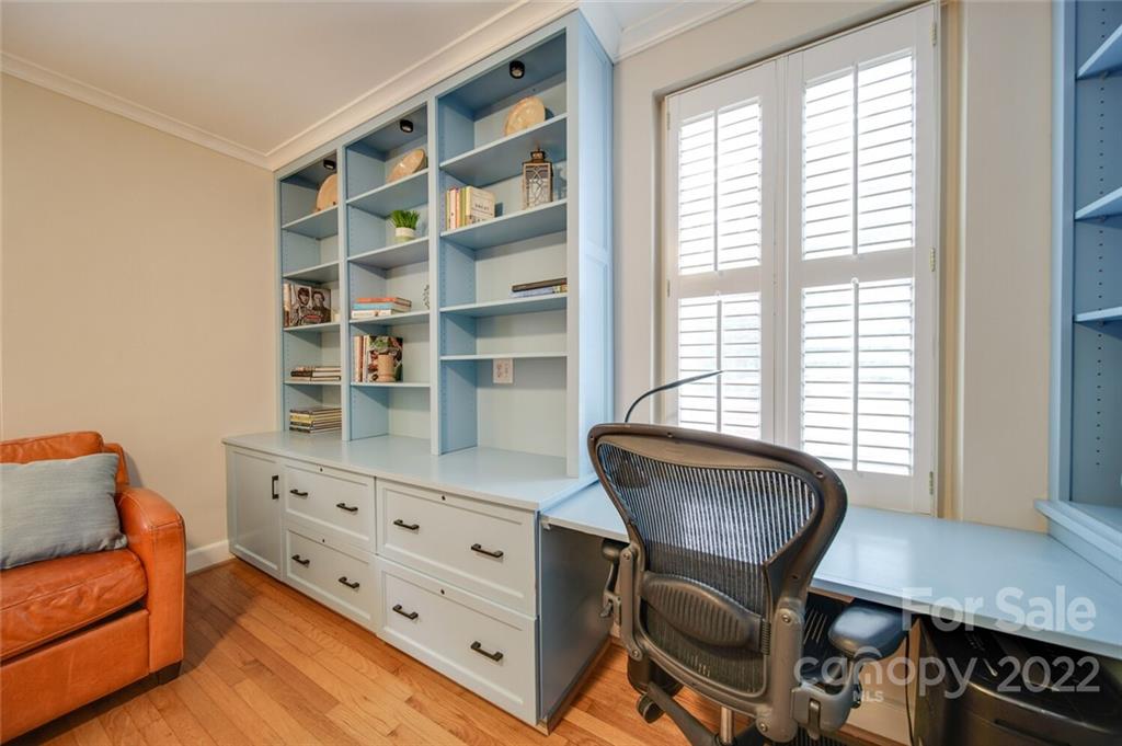 811 Queens Road, Unit 2 Charlotte, NC 28207 - Photo 21 of 31 a view of a workspace with furniture and a window