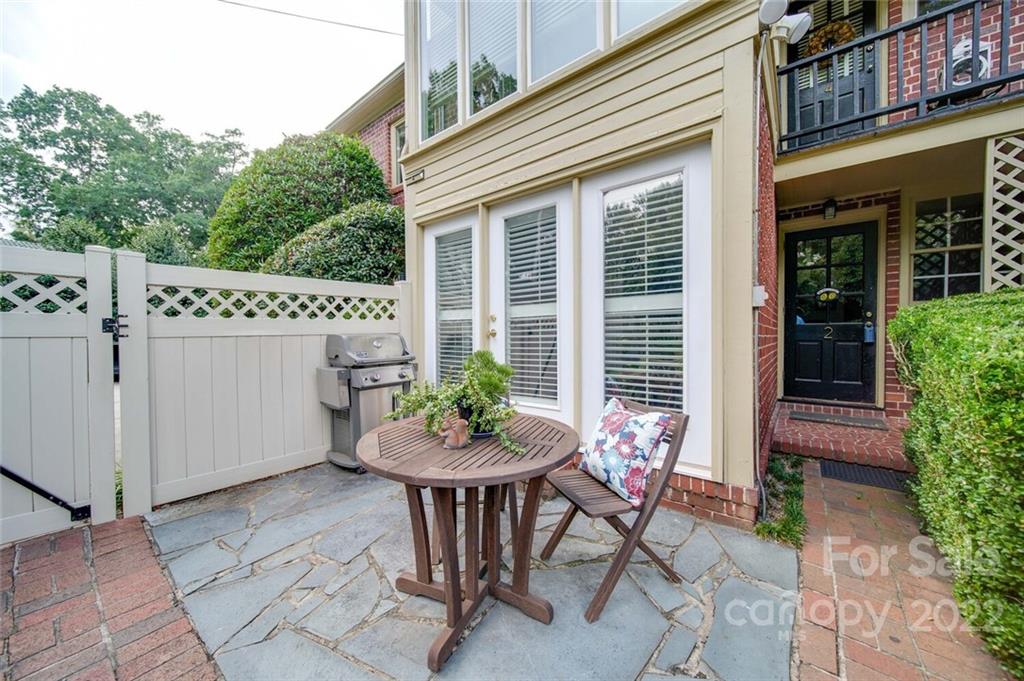 811 Queens Road, Unit 2 Charlotte, NC 28207 - Photo 22 of 31 a view of a house with backyard and sitting area
