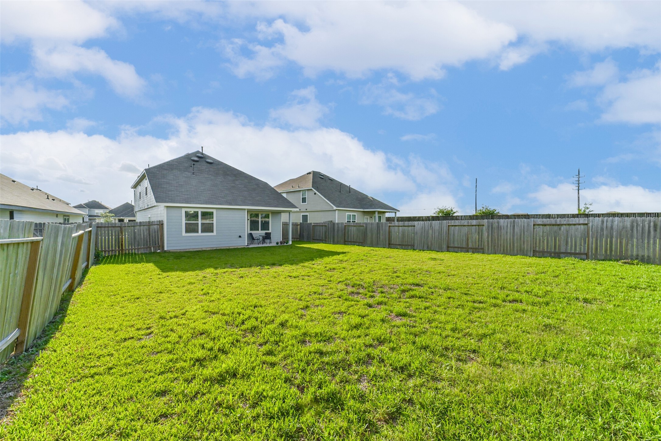 4907 Luke Matthew Drive Rosharon, TX 77583 - Photo 36 of 42 a front view of a house with a yard