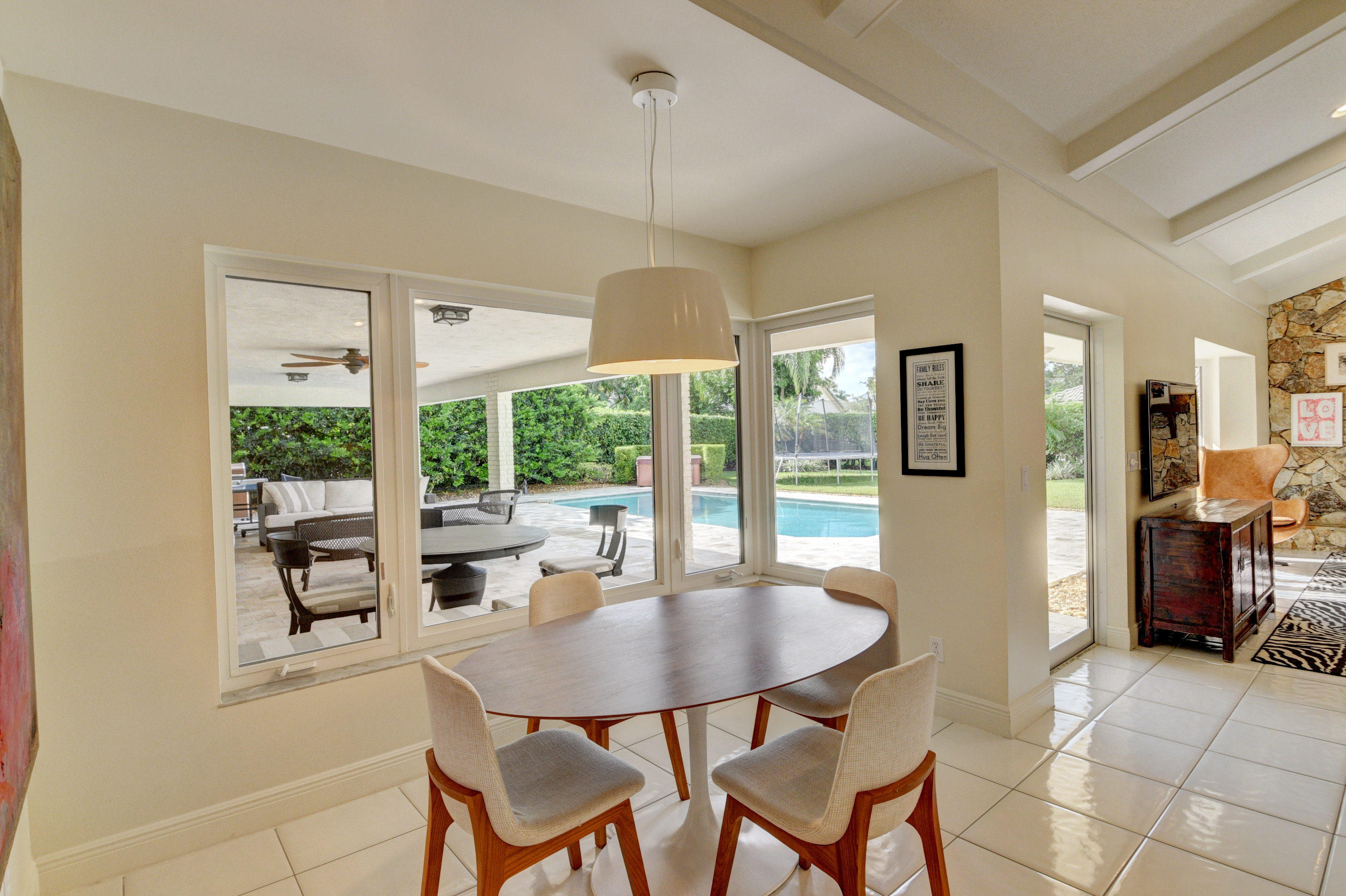7624 Marbella Terrace Boca Raton, FL 33433 - Photo 22 of 55 a view of a dining room with furniture window and outside view