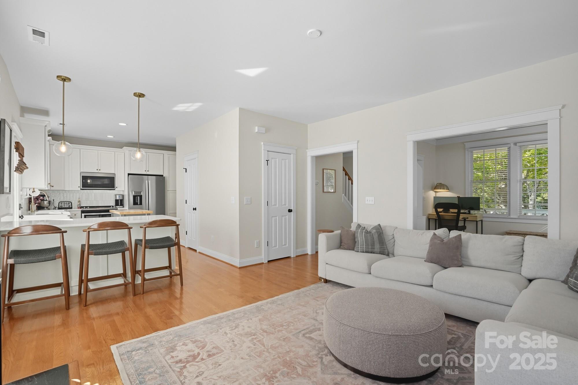 911 Cara Court Fort Mill, SC 29708 - Photo 15 of 48 a living room with furniture and kitchen view