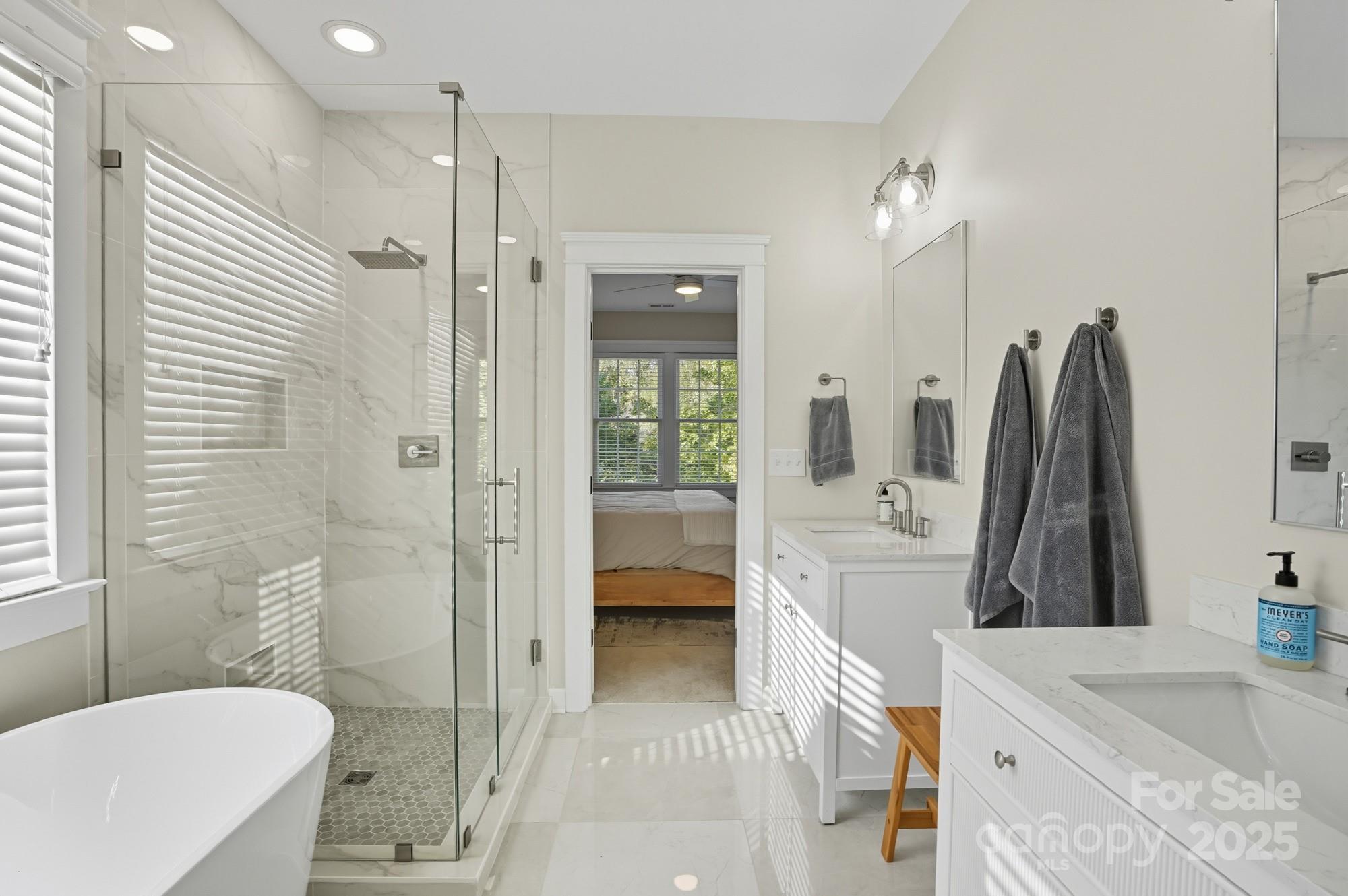 911 Cara Court Fort Mill, SC 29708 - Photo 29 of 48 a bathroom with a sink a toilet and shower
