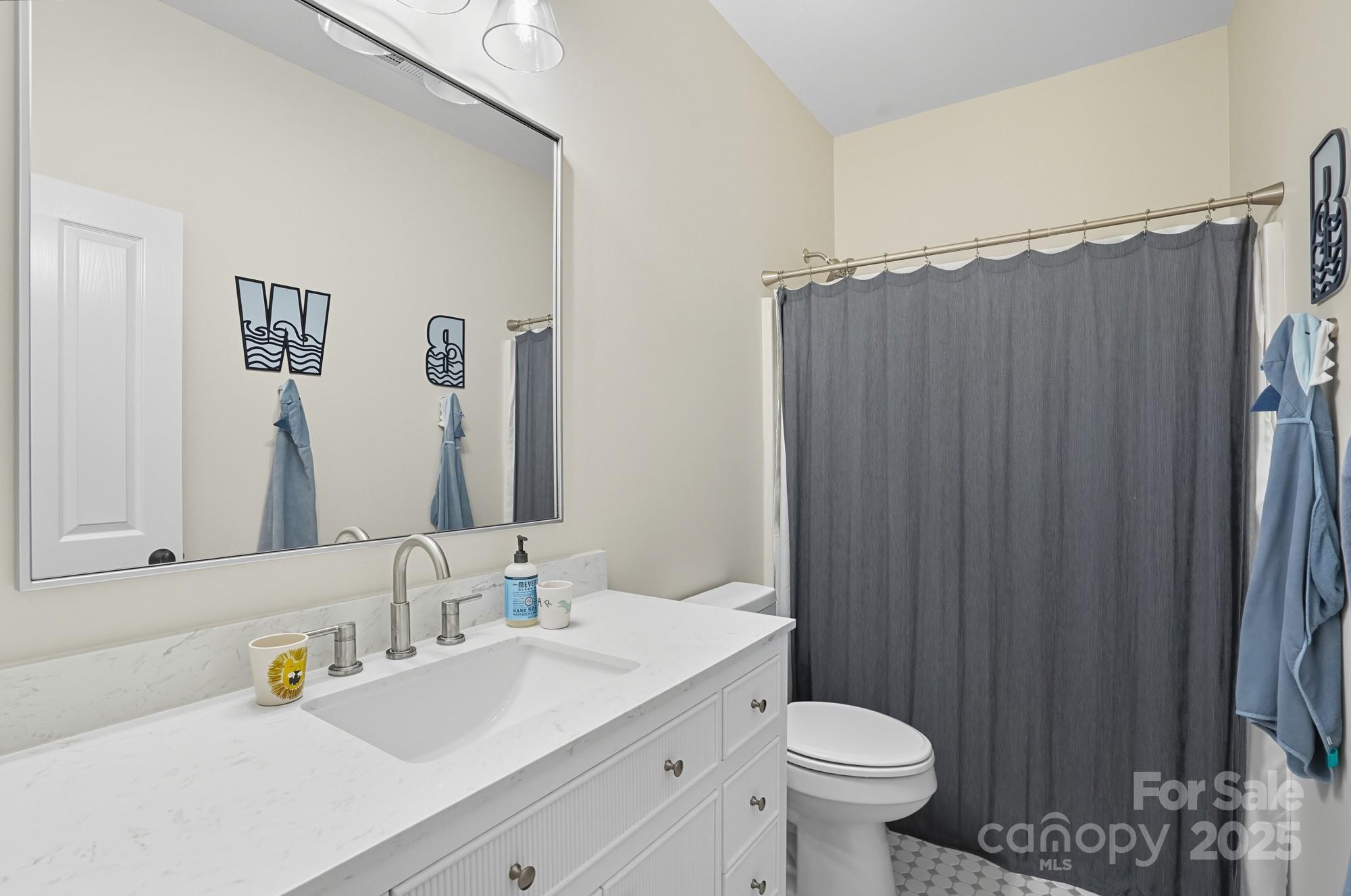 911 Cara Court Fort Mill, SC 29708 - Photo 33 of 48 a bathroom with a sink toilet and a mirror