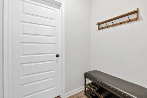 a bathroom with a sink toilet vanity and shower