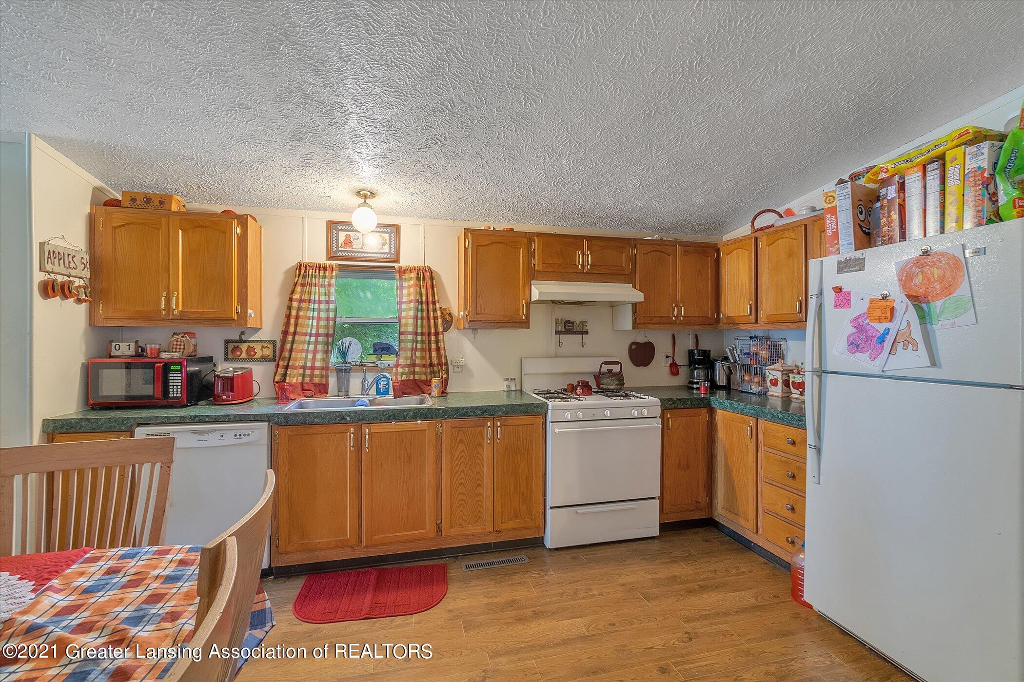 5416 Hughes Road Lansing, MI 48911 - Photo 9 of 24 09-5416 Hughes Rd-Windowstill Real Estat