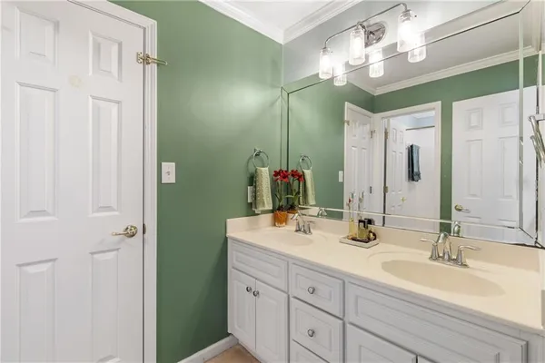 a view of a livingroom with furniture window and wooden floor