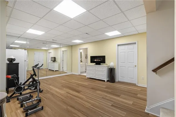 an aerial view of a residential houses with outdoor space