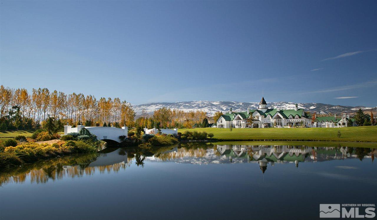 6144 Falabella Way Reno, NV 89511 - Photo 3 of 20 a view of a lake with houses