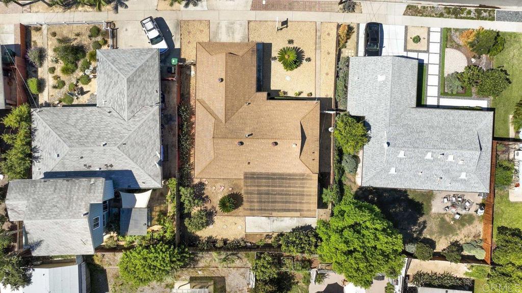 4473 Rolfe Road San Diego, CA 92117 - Photo 4 of 18 an aerial view of residential houses with outdoor space