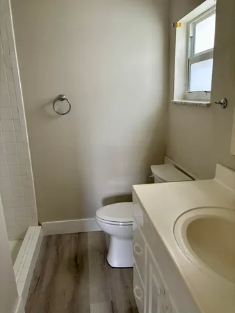 a bathroom with a sink and toilet