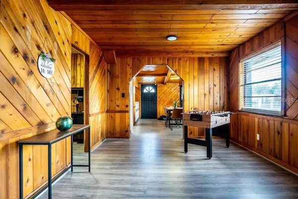a living room with furniture and a window