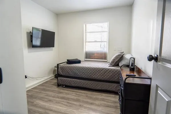 a view of an empty room with a window