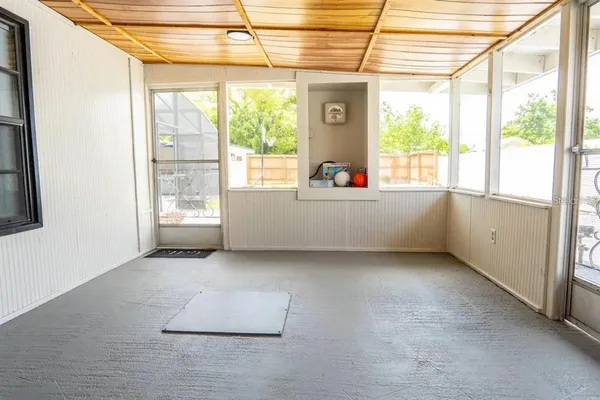 a view of a house with wooden floor and roof