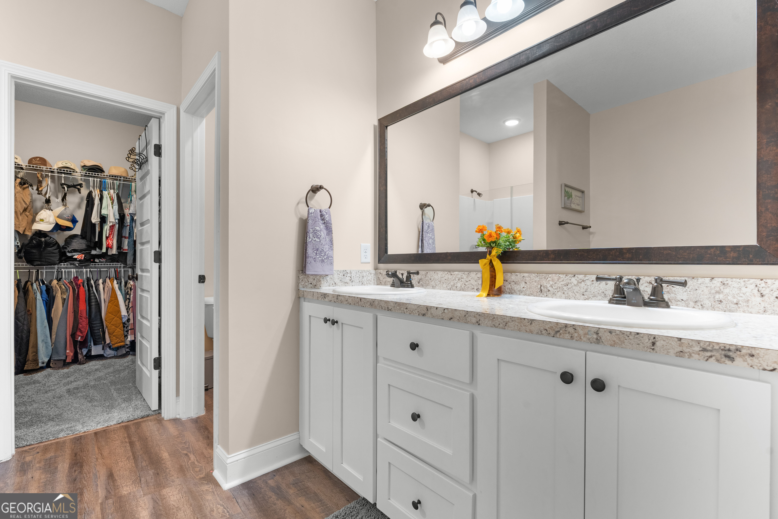 321 Farmington Road Statesboro, GA 30458 - Photo 14 of 24 a bathroom with a sink and a mirror