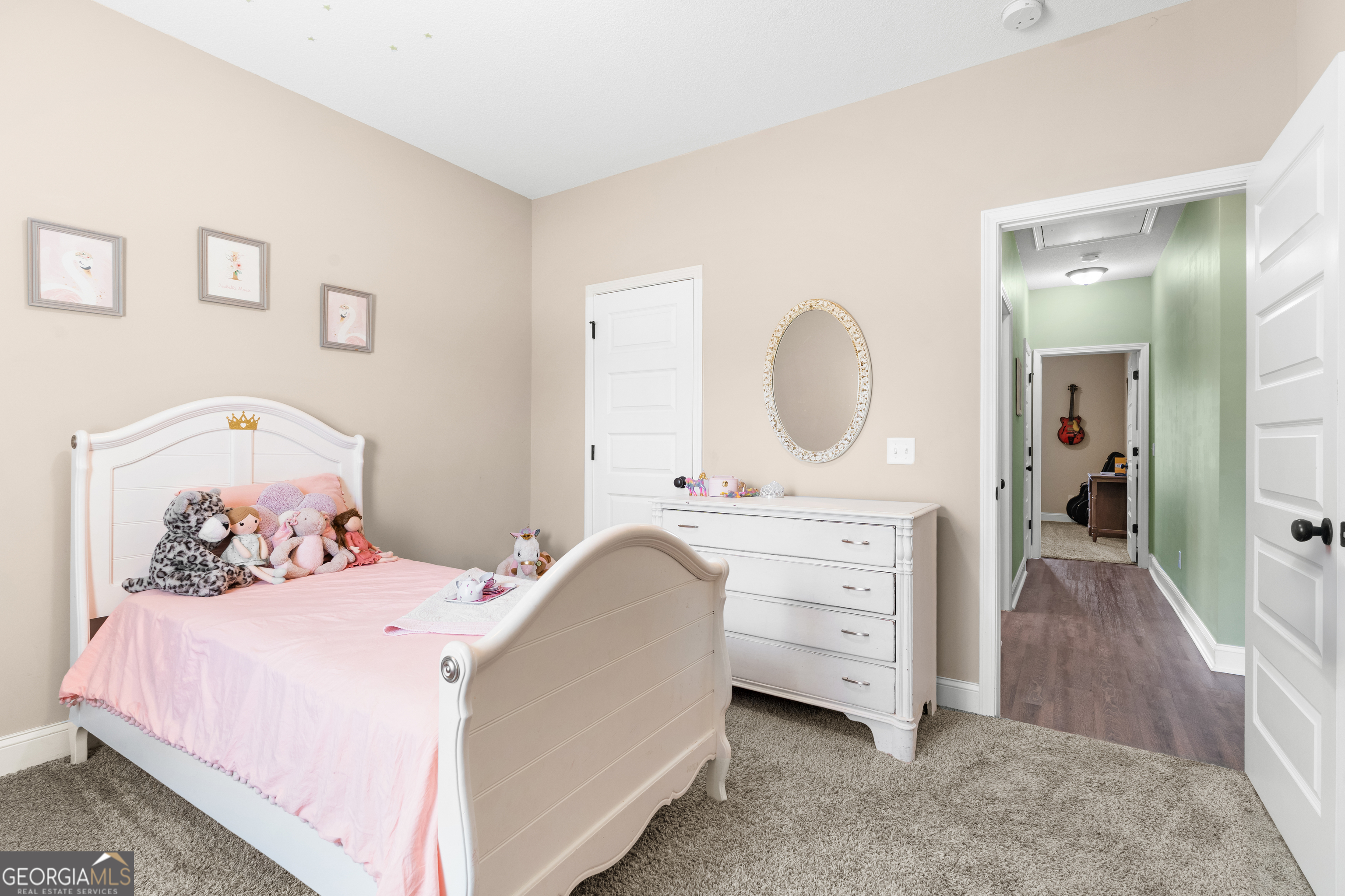 321 Farmington Road Statesboro, GA 30458 - Photo 18 of 24 a bedroom with a bed and a dresser