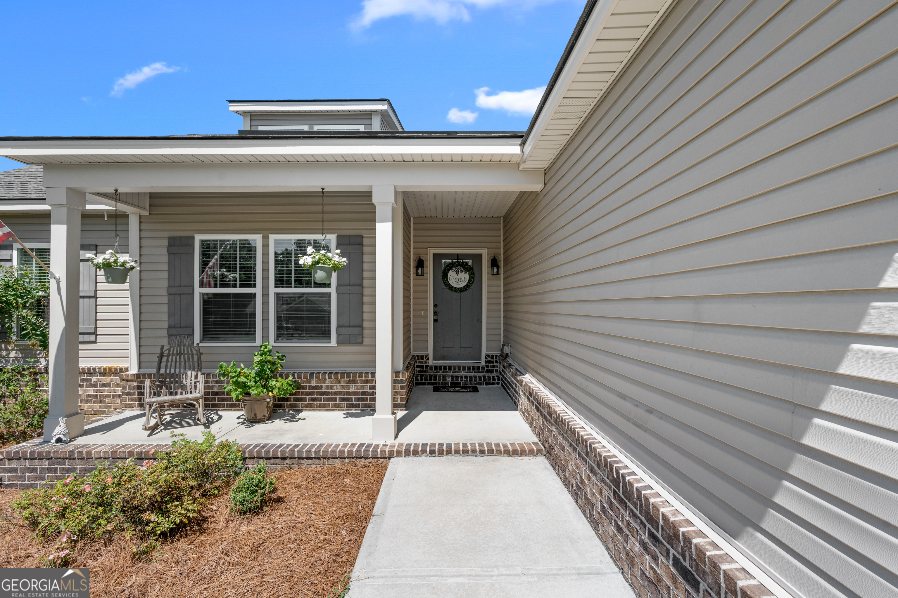 321 Farmington Road Statesboro, GA 30458 - Photo 4 of 24 a front view of a house