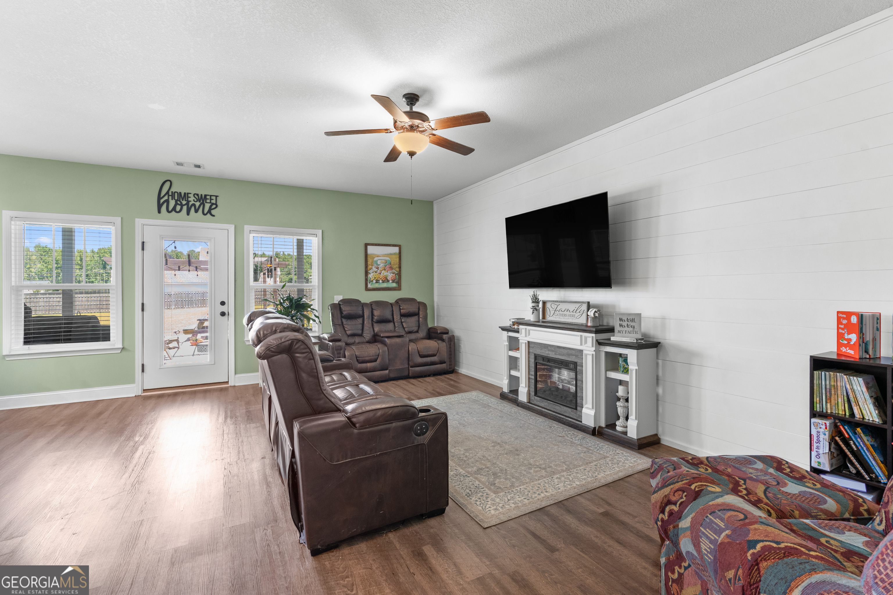 321 Farmington Road Statesboro, GA 30458 - Photo 7 of 24 a living room with furniture and a flat screen tv