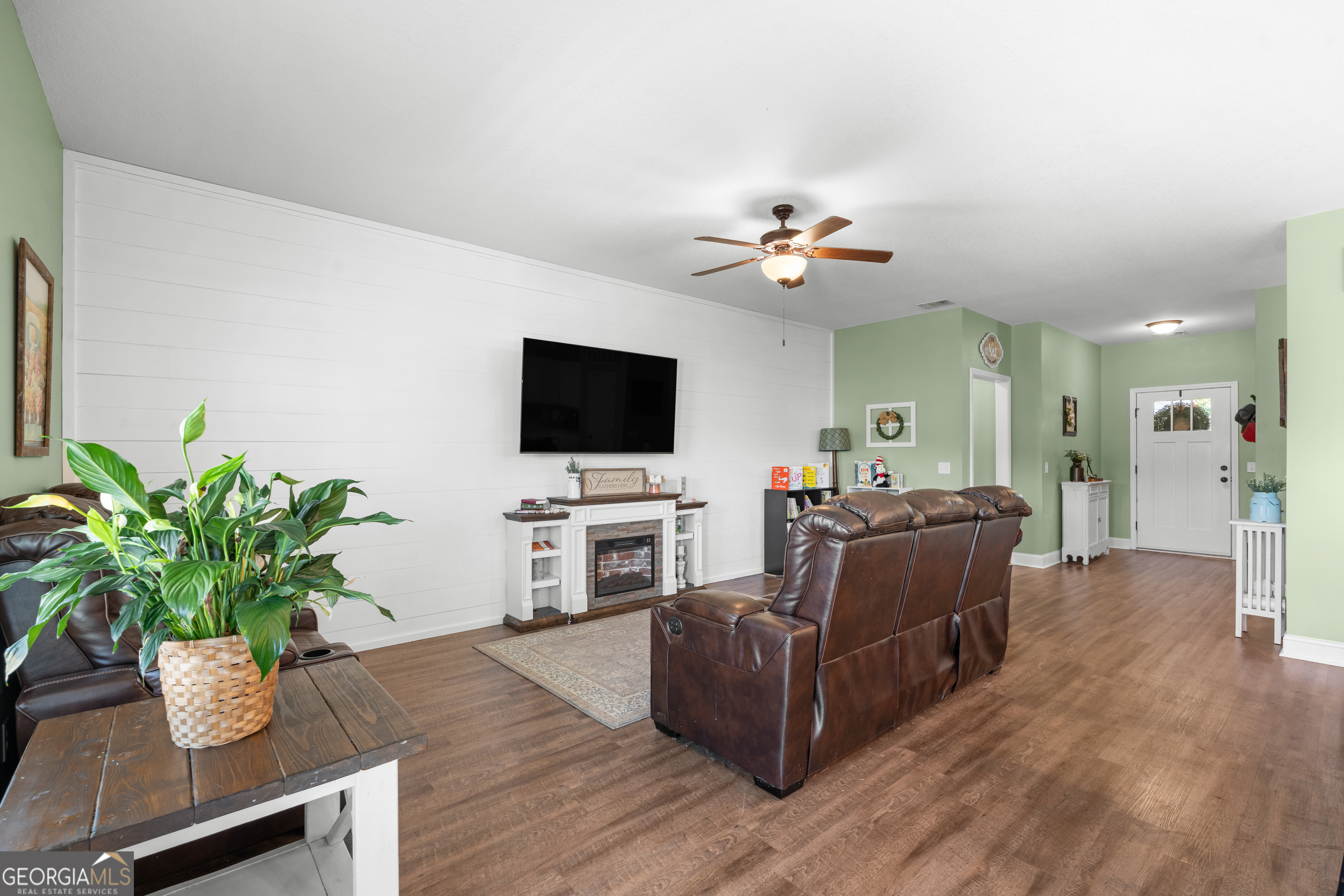 321 Farmington Road Statesboro, GA 30458 - Photo 9 of 24 a living room with furniture and a flat screen tv