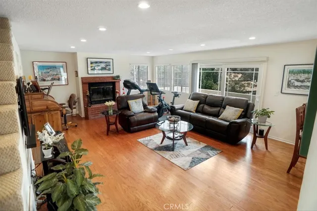 a living room with lots of furniture and a flat screen tv