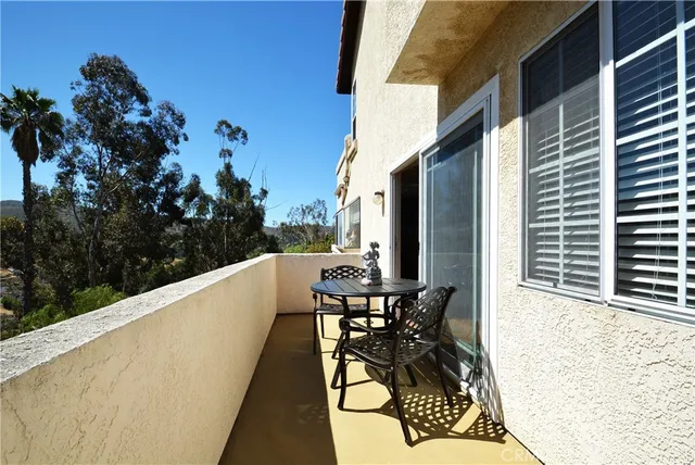 a bathroom with a sink vanity and mirror